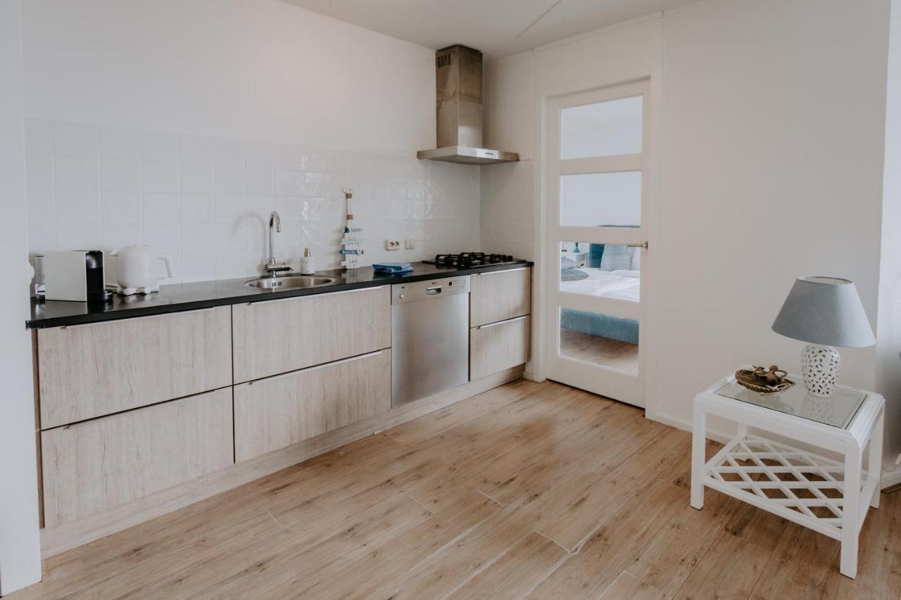 Stijlvol Appartement Op Strand Makkum Bagian luar foto